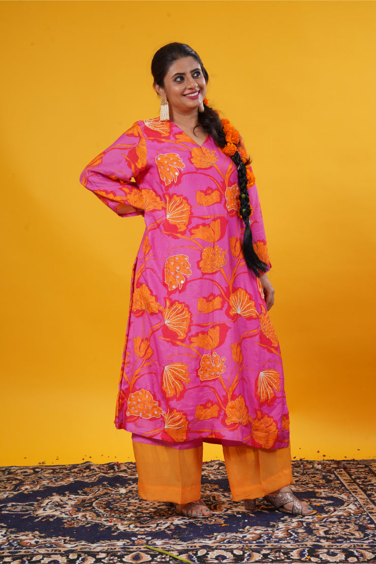 Fuschia pink floral suit set with long sleeves and palazzo