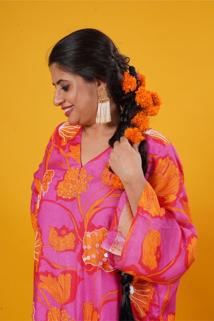 Fuschia pink floral suit set with long sleeves and palazzo